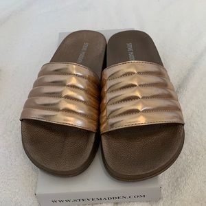Steve Madden pool slides.